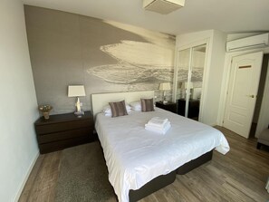 2 bedrooms, in-room safe, iron/ironing board, travel cot