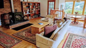 Smart TV, fireplace, books, stereo