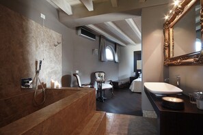Bathtub, hair dryer, towels