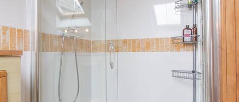 Combined shower/bathtub, jetted bath, hair dryer, bidet