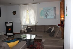 Smart TV, fireplace, table football, books