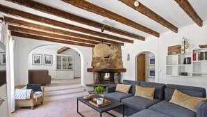 A spacious living area with a stone fireplace, a sofa set, and a coffee table. - Stunning property in the heart of Provence. Big pool area.. Fully ventilated (Vidauban)