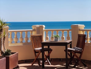 Outdoor dining - Luxury beach penthouse apartment in ISLA CANELA. The best views front line beach (URBANIZACION LOS CISNES)