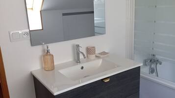 Bathtub, hair dryer, soap
