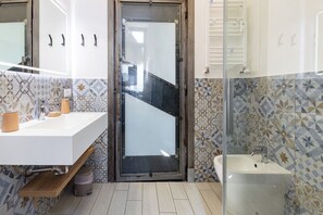 Shower, eco-friendly toiletries, hair dryer, bidet