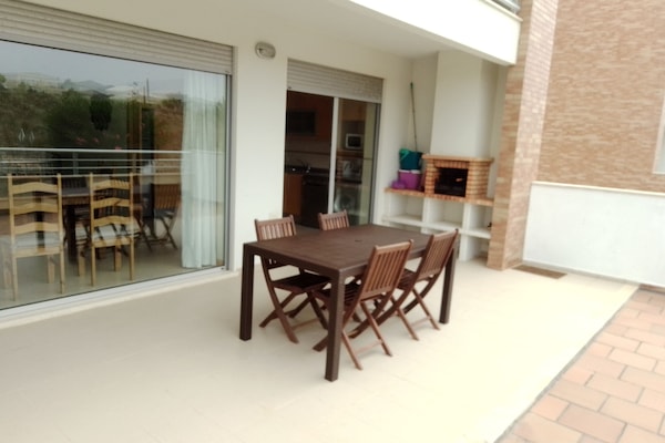Spacious terrace with private built in BBQ and large dining area