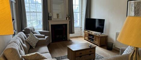 TV, DVD player, books, video library