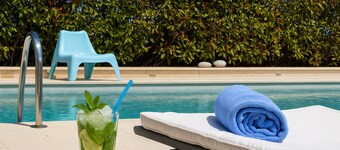 Unique Luxury villa Abelos near Airport and Athens centre, close to sandy Beach.