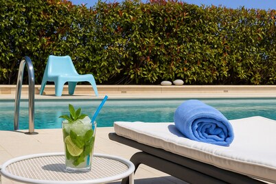 Unique Luxury villa Abelos near Airport and Athens centre, close to sandy Beach.