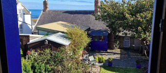 Malerisk Cottage i en lille fiskerby