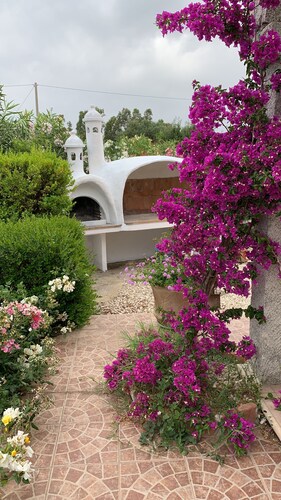 Villa with private pool, large lawn, all with sea view.