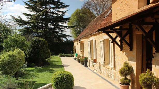 A stone building with a tiled pathway leading to a door. - "Les Mirabelles"  in deep rural France - (Gardonne)