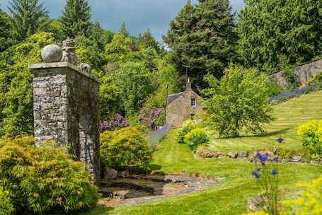 Property grounds. Secluded country retreat situated next to a magnificent walled garden at The Yair