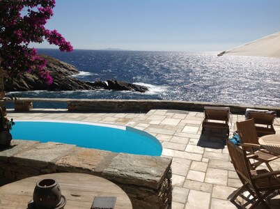Luxury Waterfront Villa with Private Pool, few steps away from a secluded beach