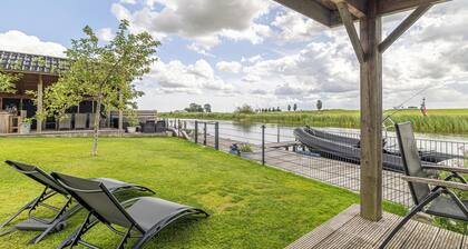 "Peace, Nature, and Comfort by the Lauwers River"