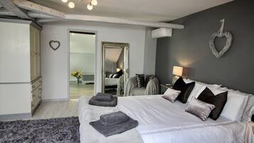 4 bedrooms, desk, iron/ironing board, travel cot