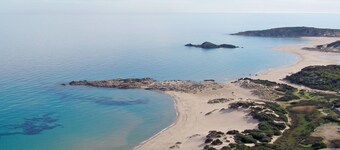 Bithia Houses, a patio one step from the sea....! Dunes, sea, green 