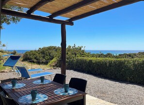 Outdoor dining - Casa Bithia, WOW effect, a patio one step away from the sea! Dunes, sea, green (domus de maria)