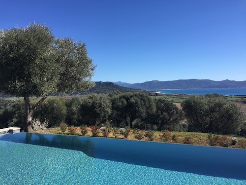 New villa with a private heated pool and a panoramic ocean and mountain view