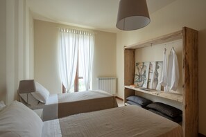 2 habitaciones, tabla de planchar con plancha y wifi gratis 