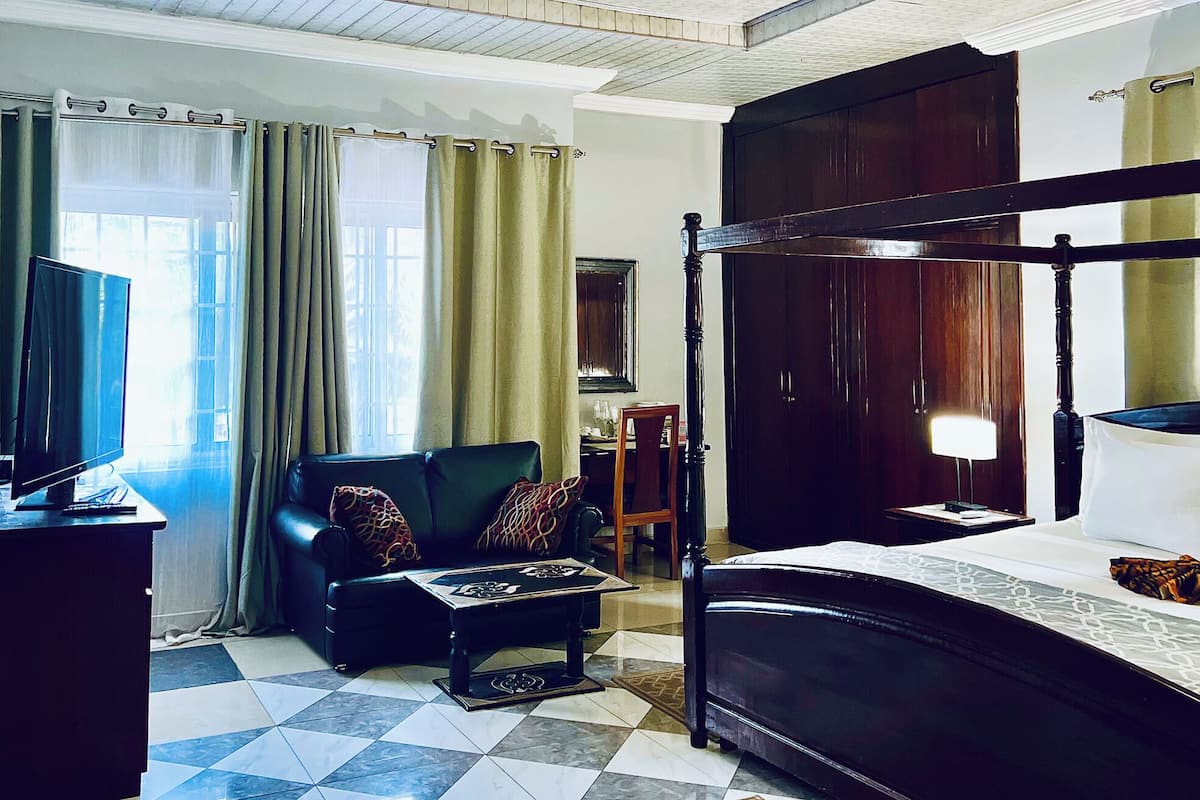 Premium bedding, desk, laptop workspace, blackout curtains