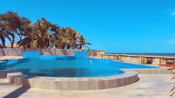 Outdoor pool, pool umbrellas, sun loungers