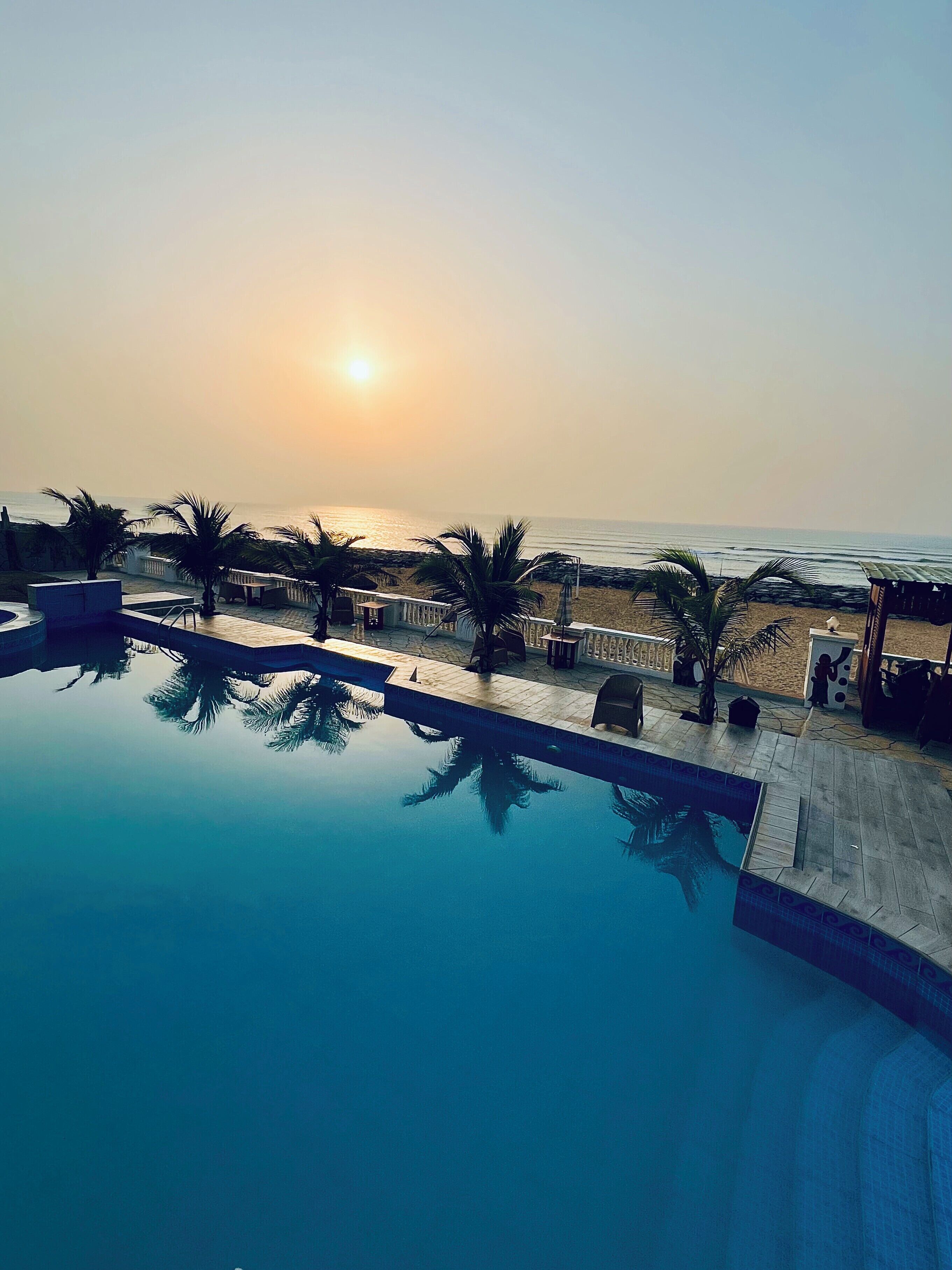 Outdoor pool, pool umbrellas, sun loungers