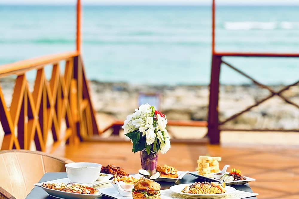 Coconut Pointe Villa & Beach Resort