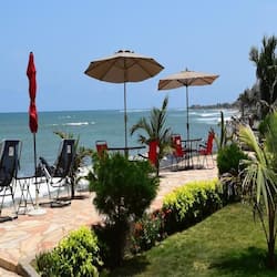 Private beach, beach umbrellas, beach towels