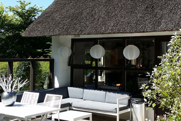 Vakantiehuis De Botter met ruim terras op het zuiden.