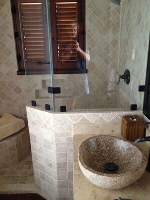 Shower, hair dryer, towels, toilet paper
