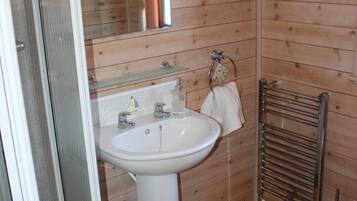 Combined shower/bathtub, hair dryer