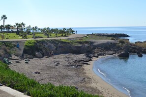 Na praia, toalhas de praia 