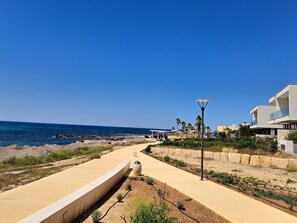 Na praia, toalhas de praia 