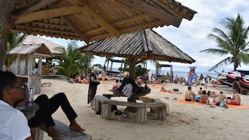 Beach nearby, sun loungers