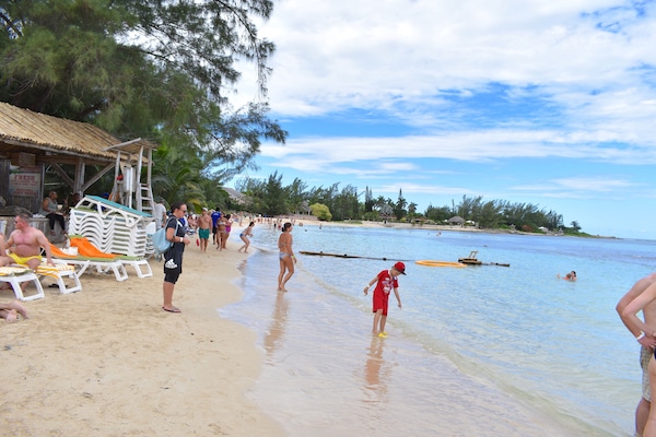 Beach nearby, sun loungers