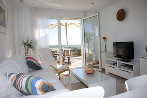Flat-screen TV, DVD player, stereo