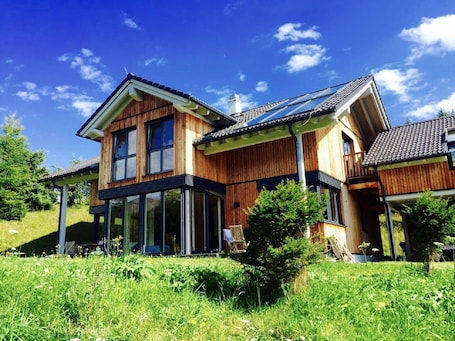 Exterior. Stylish and modern designer wooden house on the Flattnitz