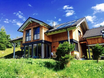 Stylish and modern designer wooden house on the Flattnitz