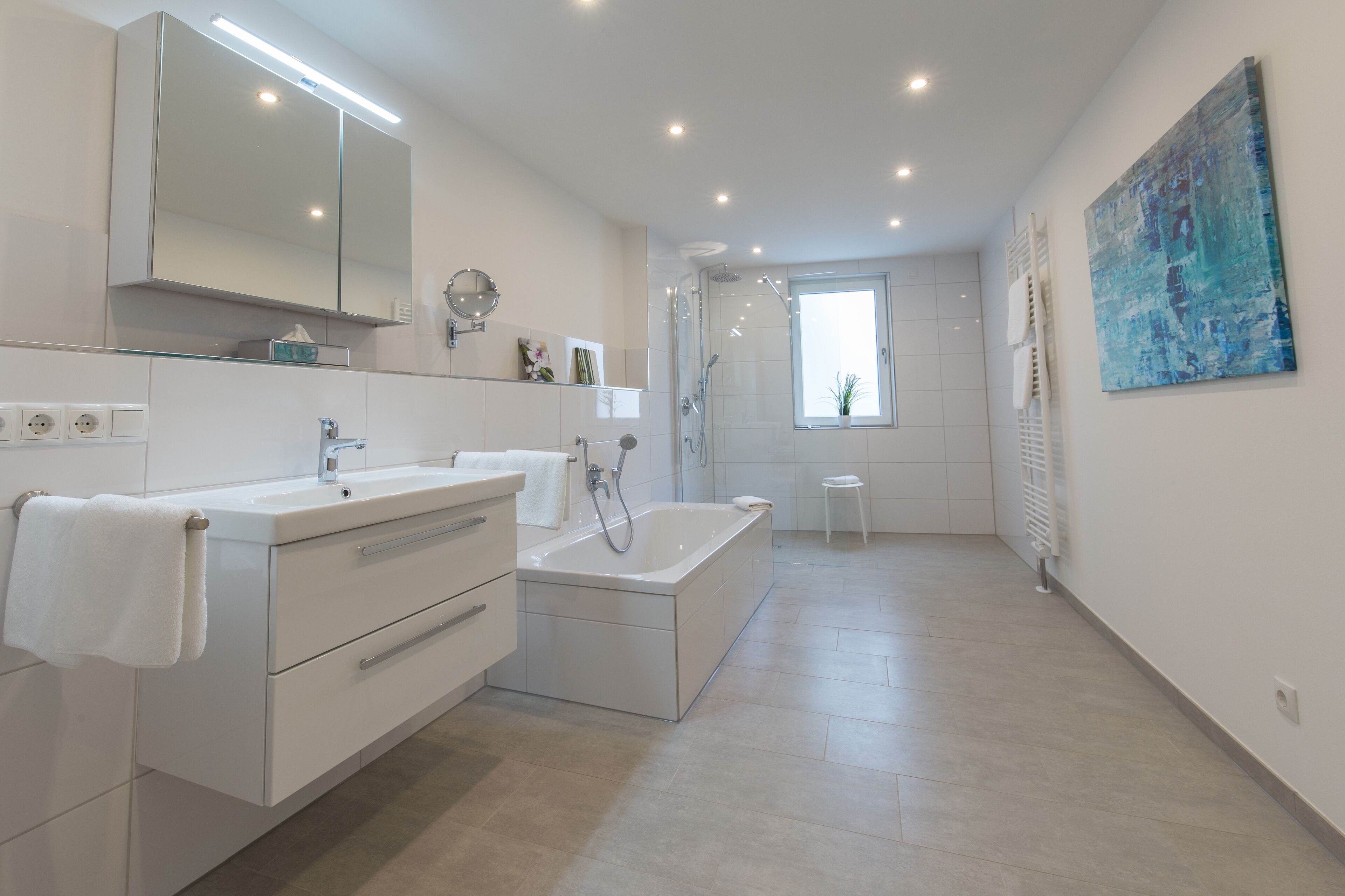 Bathtub, hair dryer, towels, soap