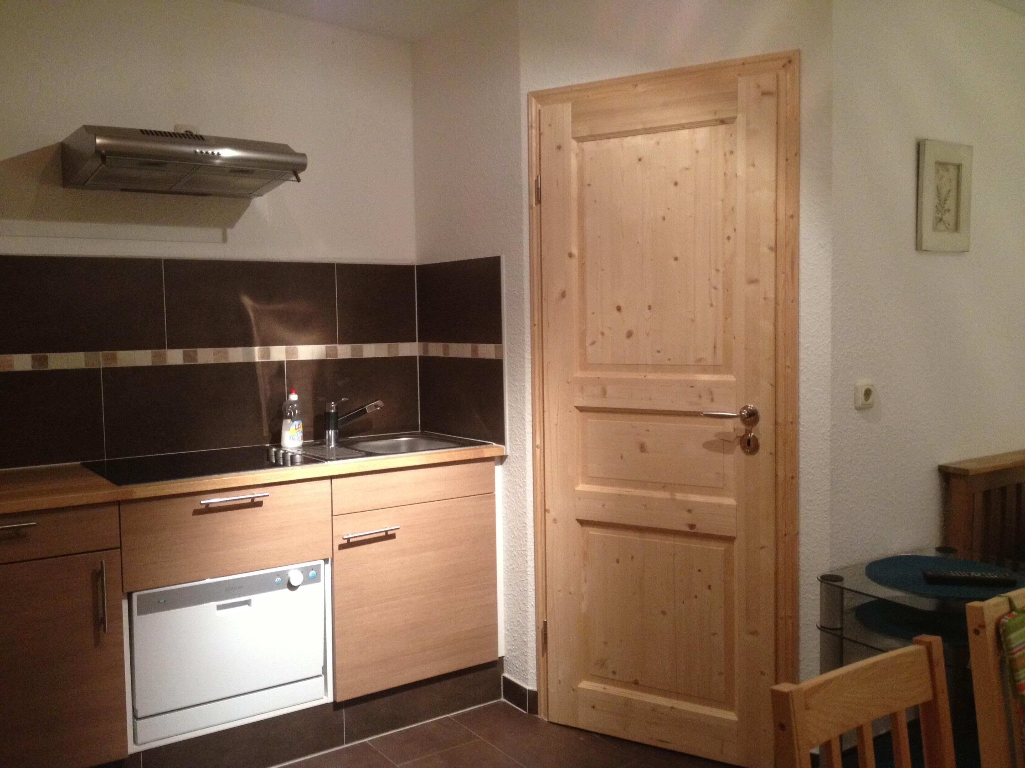 Fridge, stovetop, dishwasher, coffee/tea maker