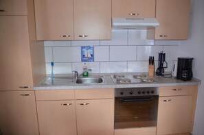 Réfrigérateur, four, plaque de cuisson, lave-vaisselle