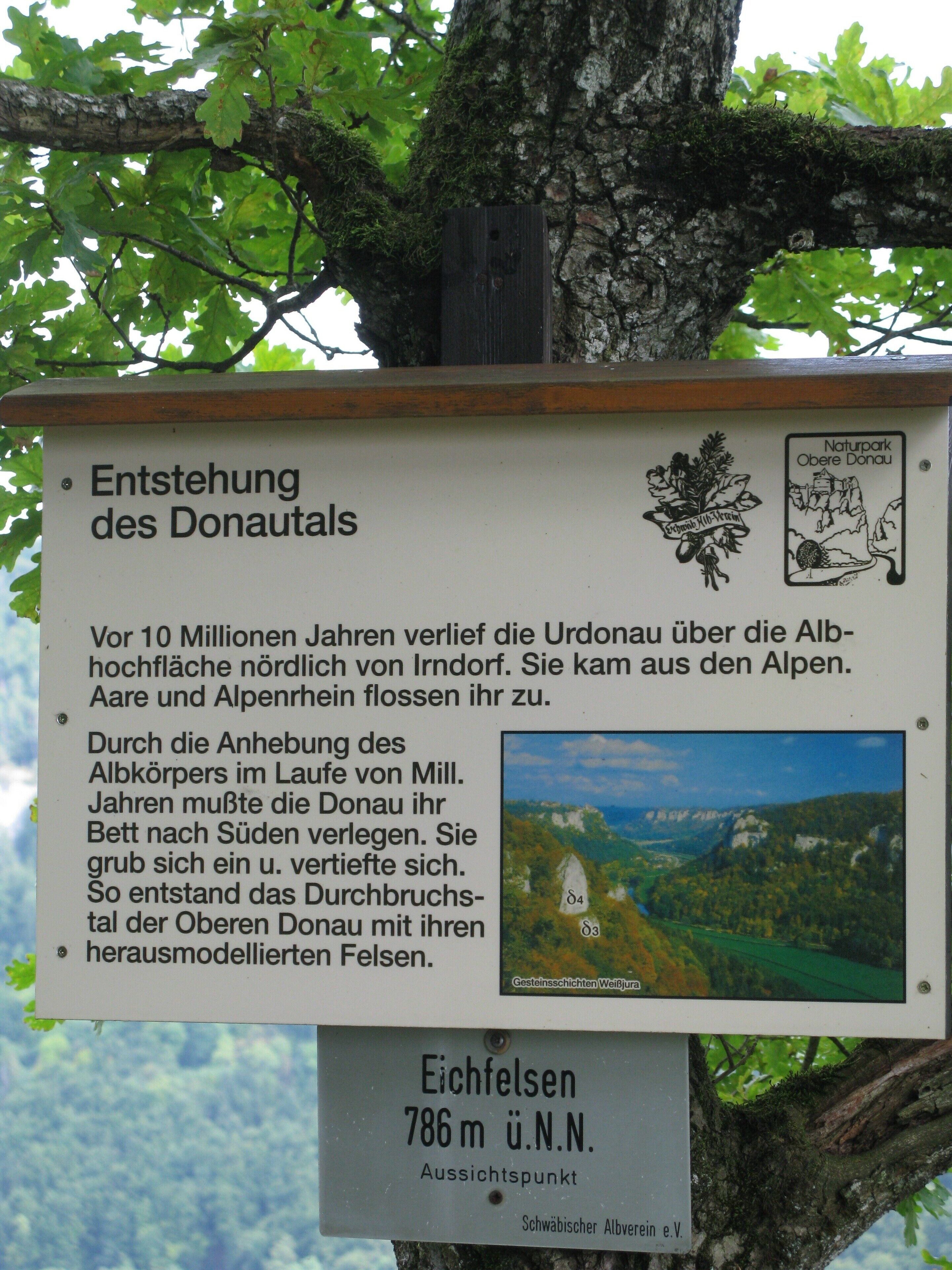 A signboard with information about the origin of the Donautal, including a map and elevation details.
