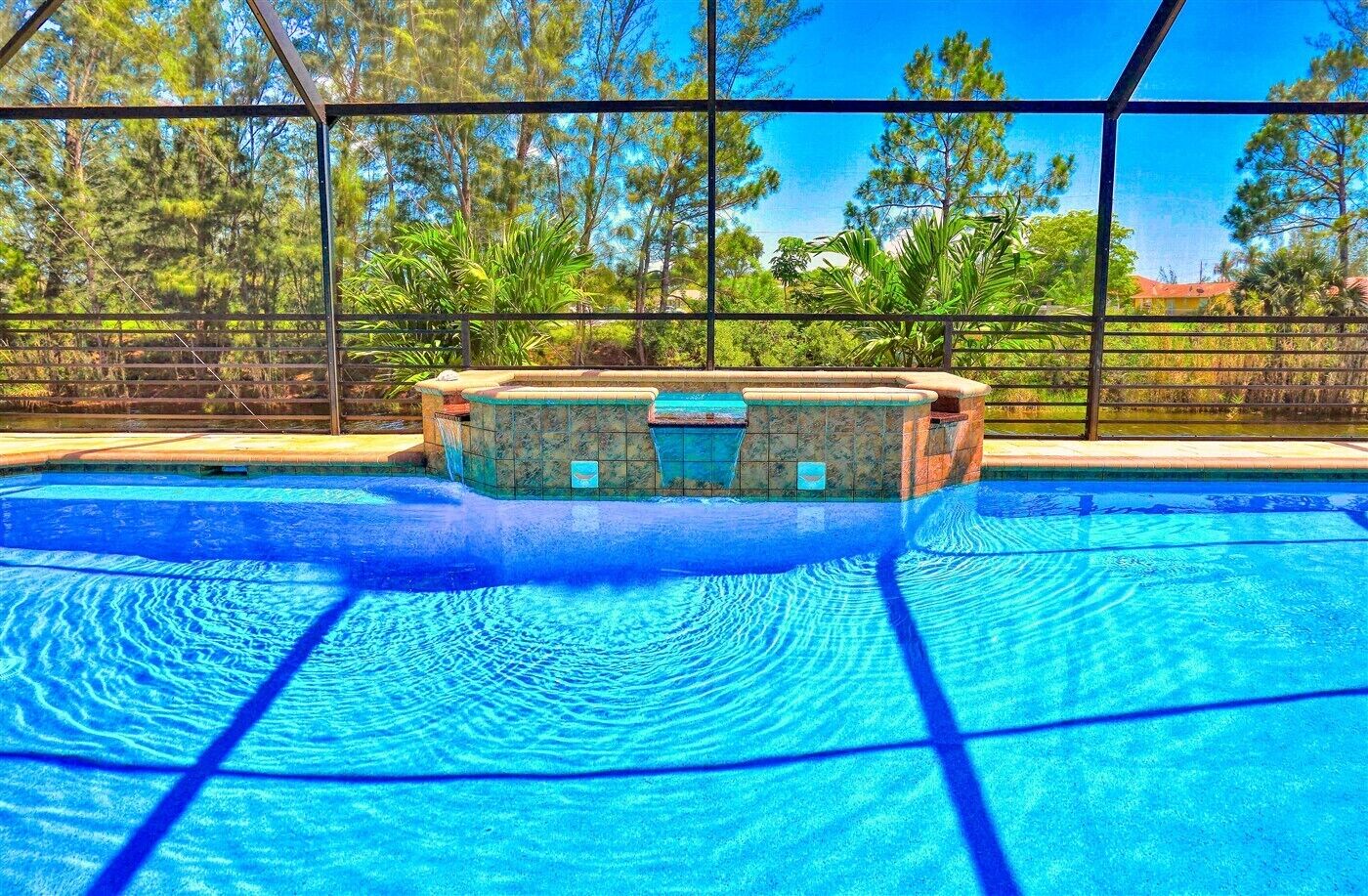 Waterfront vacation home with oversized heated pool & spa !!!