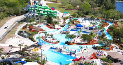 Waterfront home with oversized heated pool & spa, bikes, beach gear!