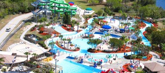 Waterfront home with oversized heated pool & spa, bikes, beach gear!