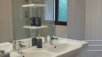 Shower, hair dryer, towels, soap