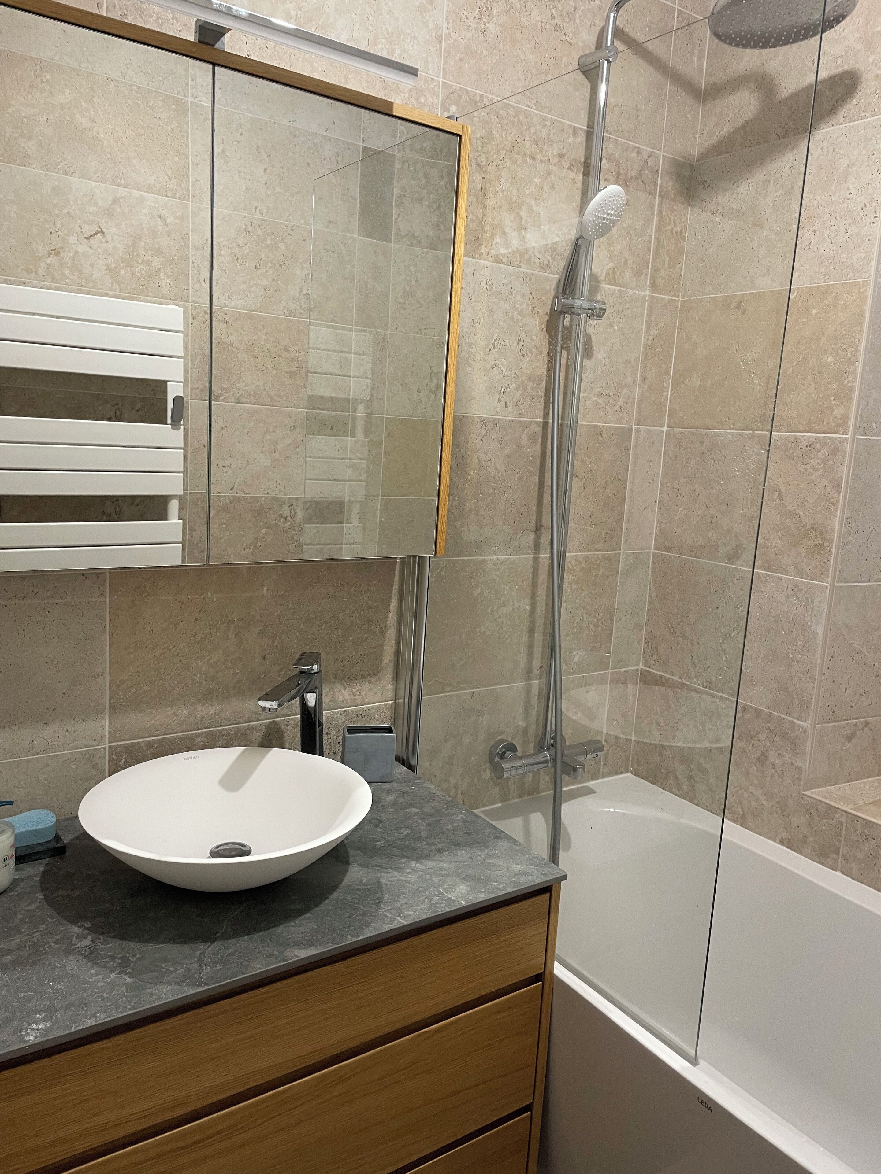 Bathtub, hair dryer, bidet