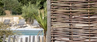 Under the wisteria of Costebelle on a wooded plot of 7500m2 private swimming pool