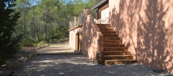 Detached villa with shared pool and summer kitchen.
